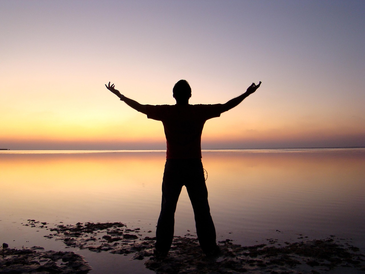 man, silhouette, beach, sunset, dusk, twilight, afterglow, male silhouette, open arms, backlighting, freedom, horizon, nature, ocean, person, sea, seashore, sunrise, water